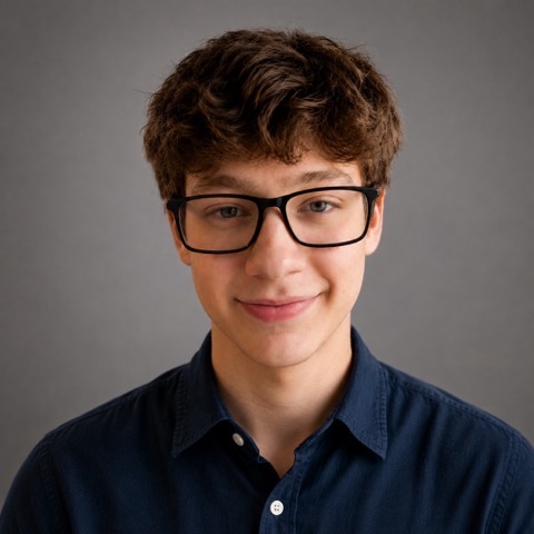 Gavin Ice, photographed against a plain grey background.